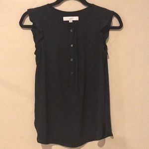 Flirty black short sleeve blouse.